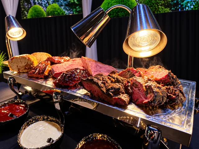 Carving station under silver heat lamps