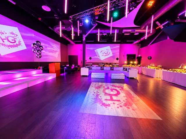 Celebration lounge with pink event lighting