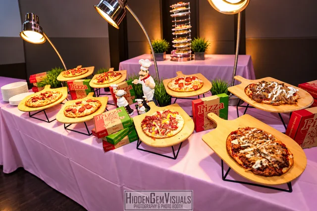 Pizzas displayed on wooden serving boards