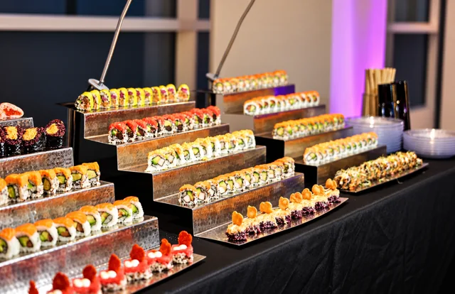 Tiered sushi and appetizer display