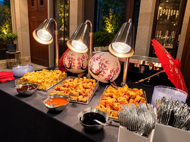 Asian-style appetizers with dipping sauces