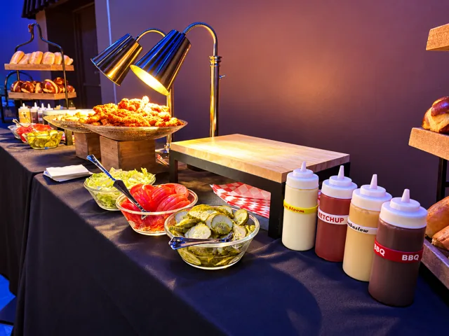 Hot food station with sauces and toppings