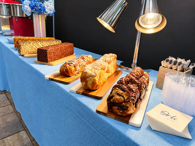 Sweet braided loaves and dessert display