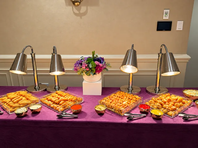 Hot buffet with pasta and roasted vegetables