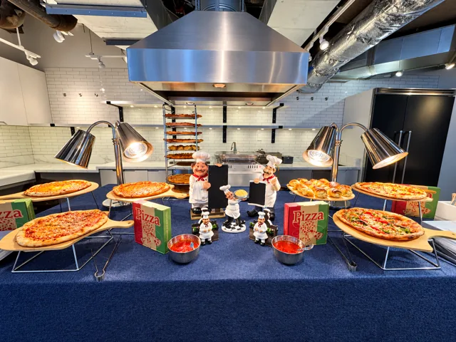 Pizza station with assorted toppings